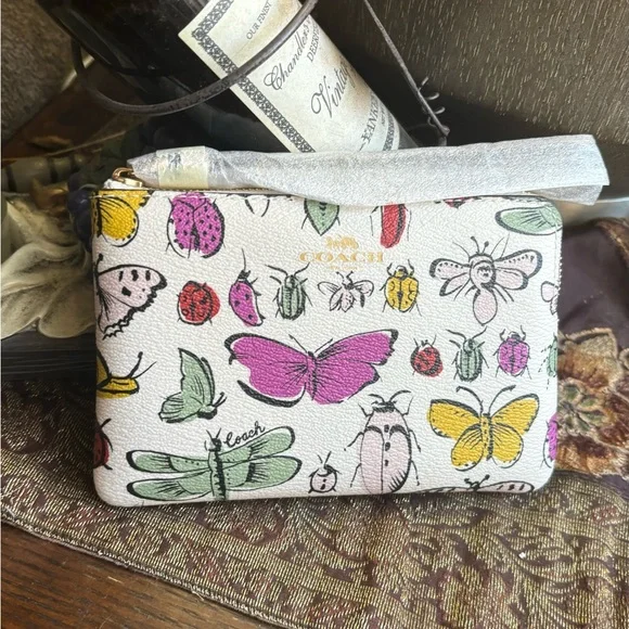 Authentic COACH Leather  butterfly  zip card wristlet - Picture 2 of 7